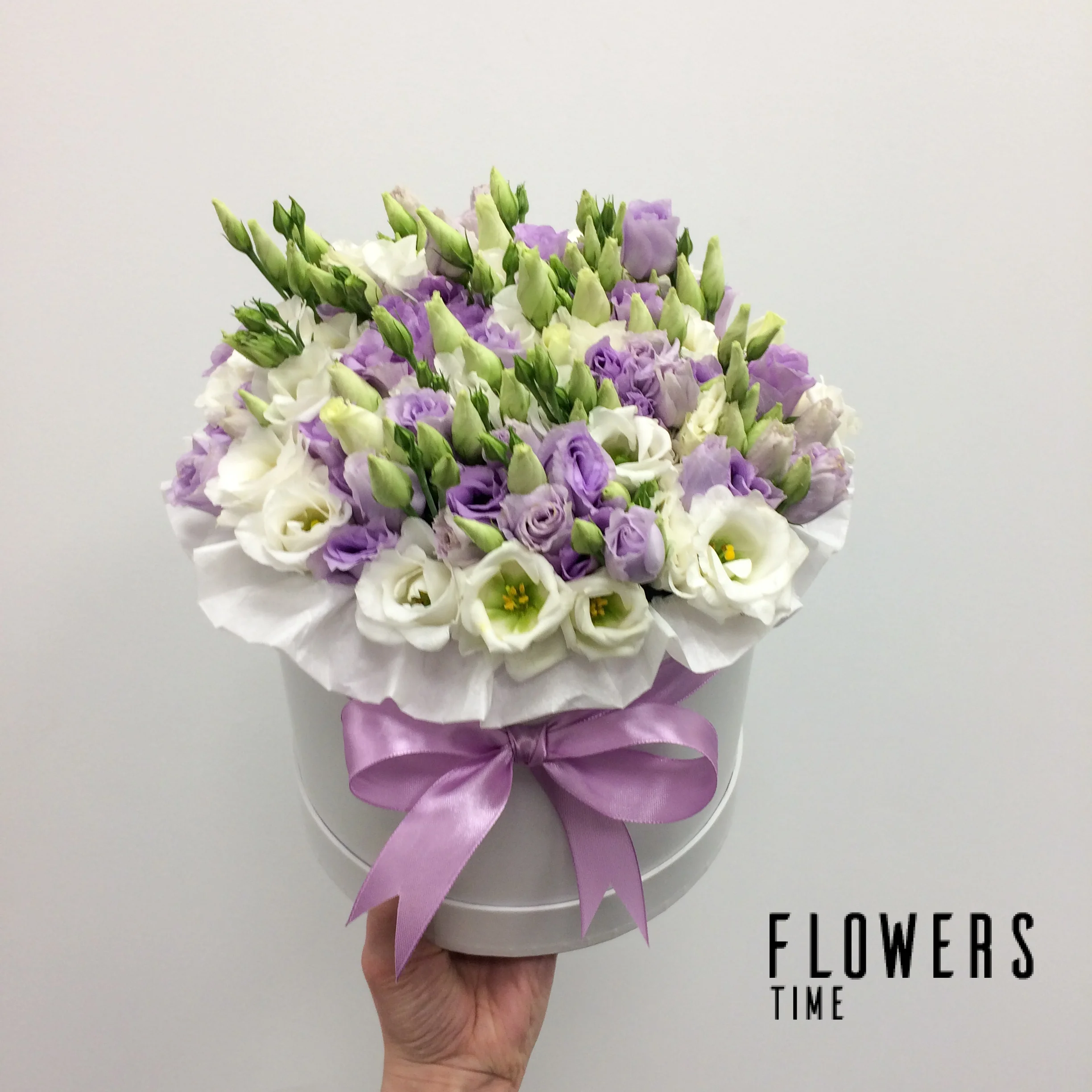 Box of white and lavender eustomas