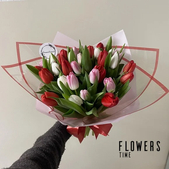 Bouquet of pink, white and red tulips